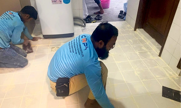 Toilet tile re-grouting